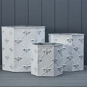 Three Large Zinc Planters with Bee detail