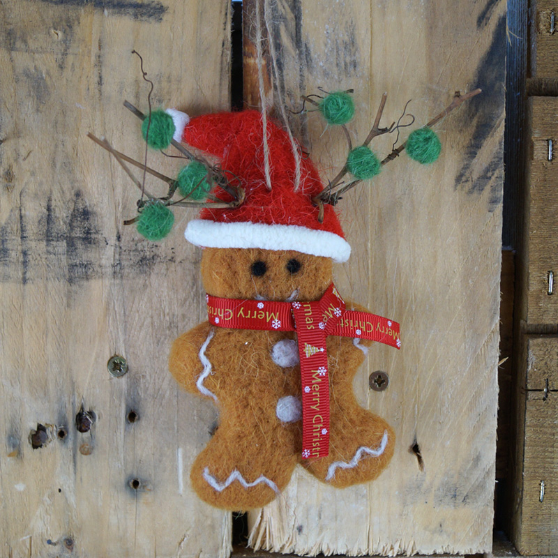 Wool Gingerbread Character in Dress and Bow detail page