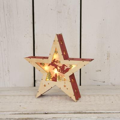 Wooden LED Star with Red edges and Santa display on his sleigh flying over Christmas trees  detail page