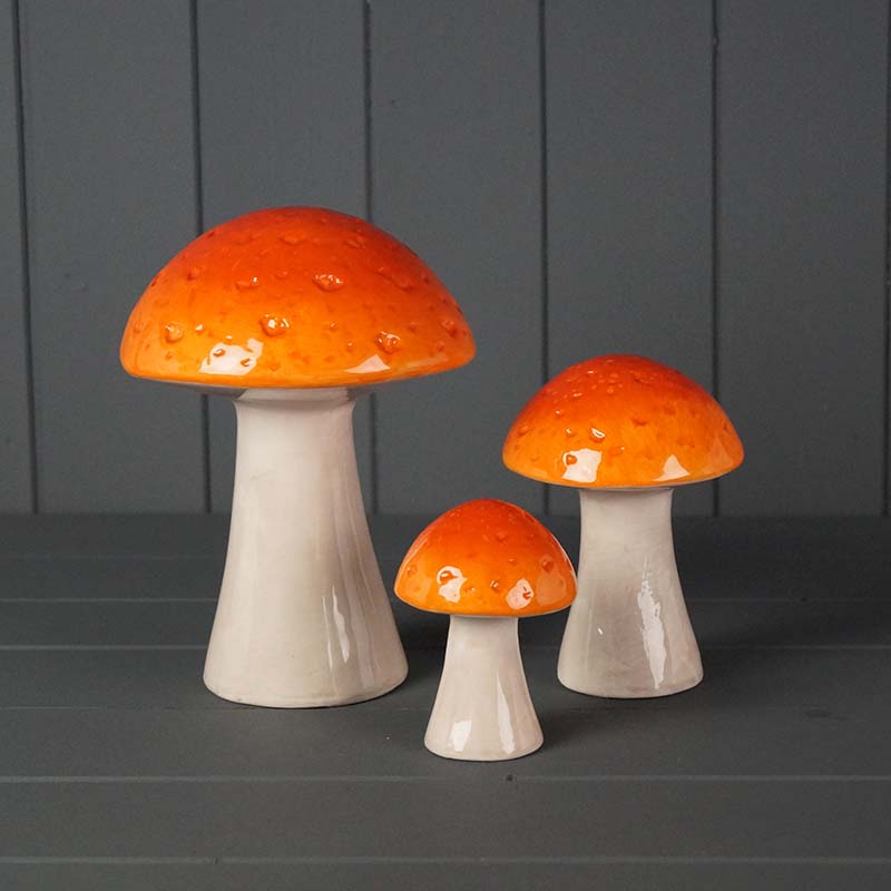 Three Orange Ceramic Mushroom Ornaments